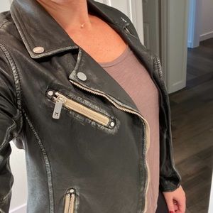 Women’s distressed leather motto jacket